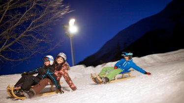 La piste Untermarkter Alm éclairée la nuit, © Imst Tourismus/Martin Lugger